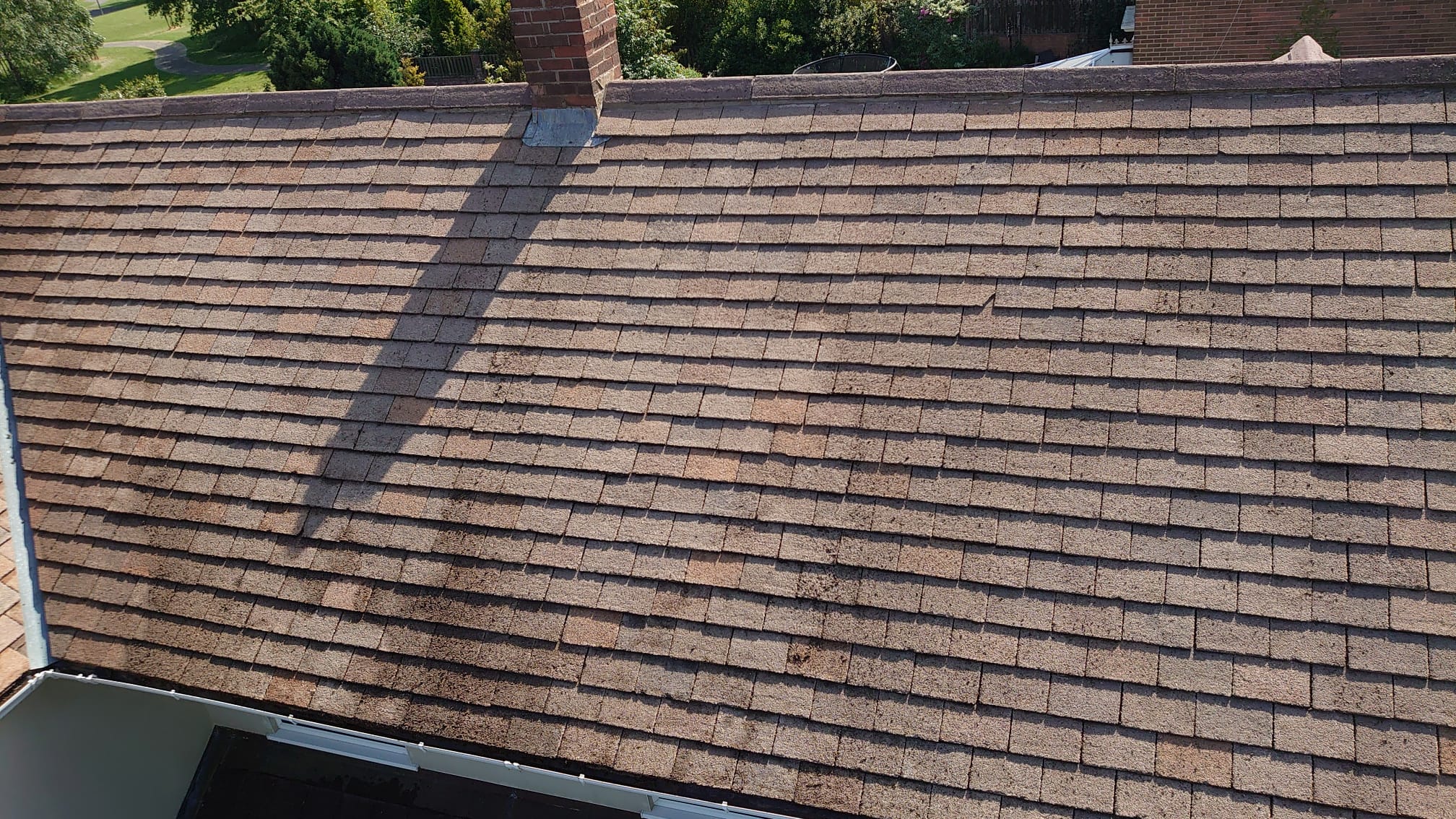 Roof Cleaning on a Budget: Don't Break the Bank!